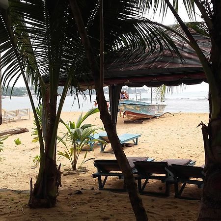 Sea Song Bed and Breakfast Unawatuna Buitenkant foto