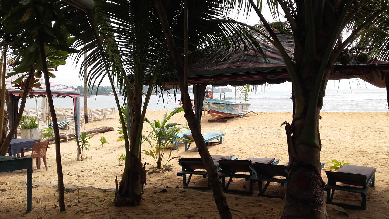 Sea Song Bed and Breakfast Unawatuna Buitenkant foto